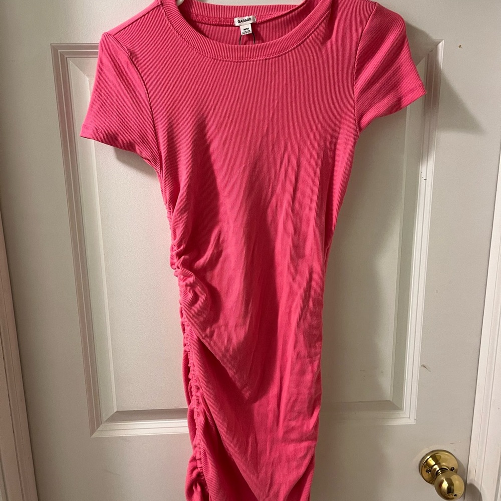 Garage: body-con dress with ties on both sides to adjust the length.